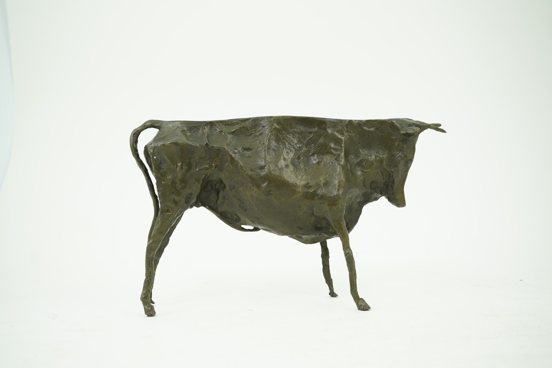 After Pablo Picasso (Spanish 1881-1973): A patinated bronze figure of an Andalusian bull